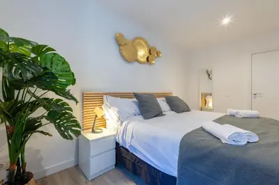 Cama o camas de una habitación en Amati Boutique Coliving Madrid