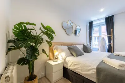 Cama o camas de una habitación en Amati Boutique Coliving Madrid
