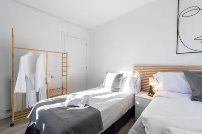 Cama o camas de una habitación en Amati Boutique Coliving Madrid