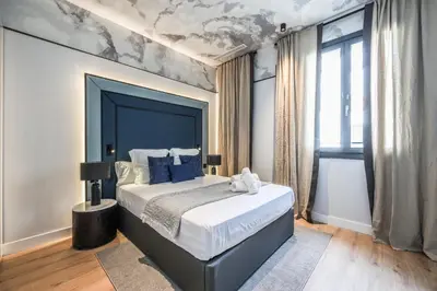 Cama o camas de una habitación en ColivINN Plaza Mayor II