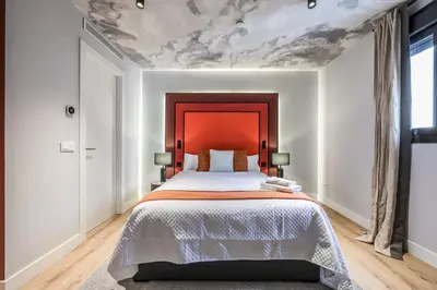 Cama o camas de una habitación en ColivINN Plaza Mayor II