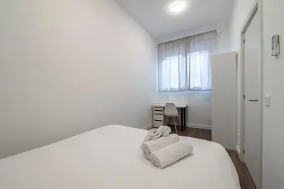 Cama o camas de una habitación en GuestReady – Quiet and modern apartment in Madrid