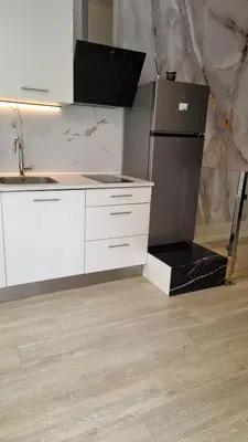 Una cocina o zona de cocina en madrid tofi