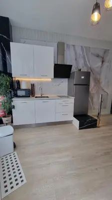 Una cocina o zona de cocina en madrid tofi