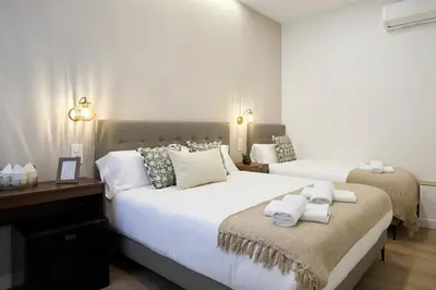 Cama o camas de una habitación en AC Rooms Madrid Centro