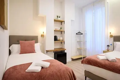 Cama o camas de una habitación en AC Rooms Madrid Centro