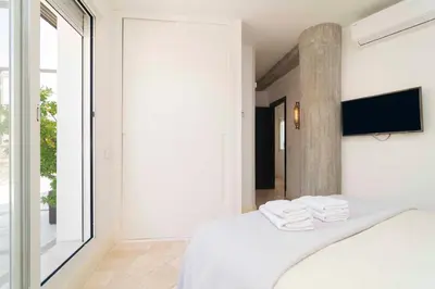 Cama o camas de una habitación en Ático exclusivo junto a Plaza Mayor