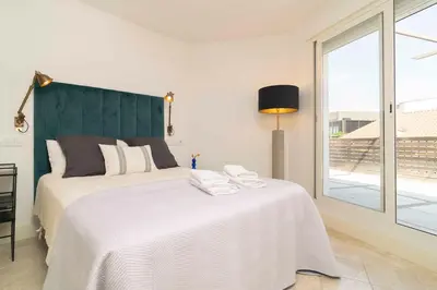 Cama o camas de una habitación en Ático exclusivo junto a Plaza Mayor