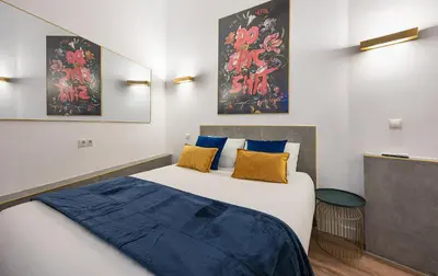 Cama o camas de una habitación en ººIM La Latina-City Centre-WiFi-AC-SmartTVºº