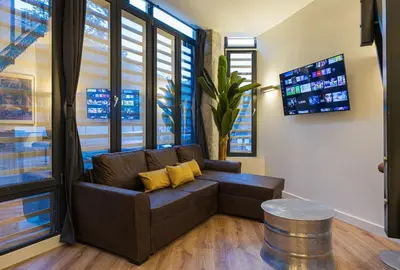 Una televisión o centro de entretenimiento en ººIM La Latina-City Centre-WiFi-AC-SmartTVºº