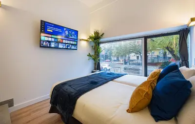 Cama o camas de una habitación en ººººIM La Latina-City Centre-WiFi-AC-SmartTVºººº