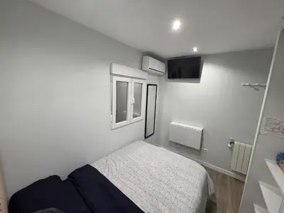 Cama o camas de una habitación en Habitación privada con baño compartido en Madrid