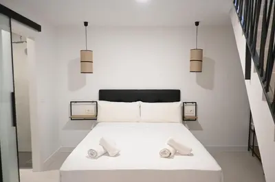 Cama o camas de una habitación en Homenfun Madrid Atocha