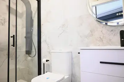 Un baño de Homenfun Madrid Atocha
