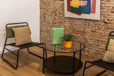Zona de estar de Queen's Malasaña Boutique I - Alojamiento corta estancia