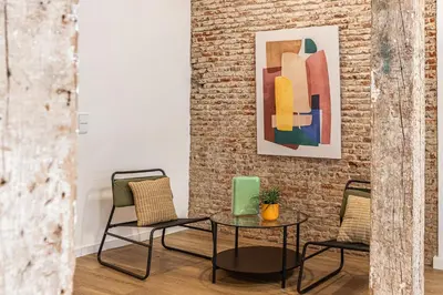Zona de estar de Queen's Malasaña Boutique I - Alojamiento corta estancia
