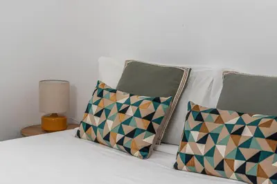 Cama o camas de una habitación en Queen's Malasaña Boutique I - Alojamiento corta estancia