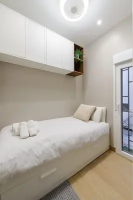 Cama o camas de una habitación en GuestReady - Lovely flat in the heart of Madrid