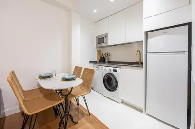 Una cocina o zona de cocina en Toro Urban Suites