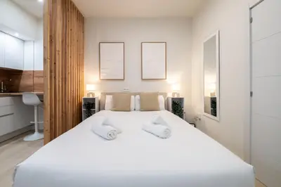 Cama o camas de una habitación en GuestReady - Cute Studio in the heart of Madrid