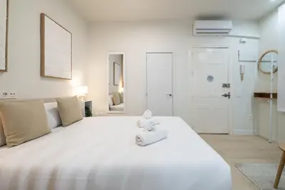 Cama o camas de una habitación en GuestReady - Cute Studio in the heart of Madrid