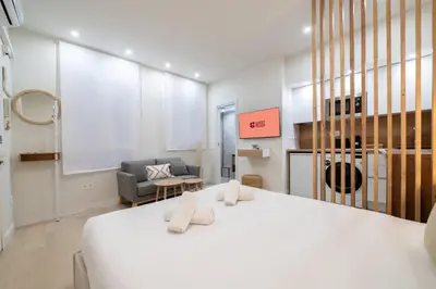 Cama o camas de una habitación en GuestReady - Cute Studio in the heart of Madrid