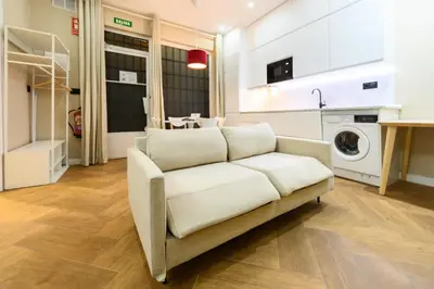 Zona de estar de Acogedor estudio interior con todas las comodidades en el centro de Madrid NDA11BII