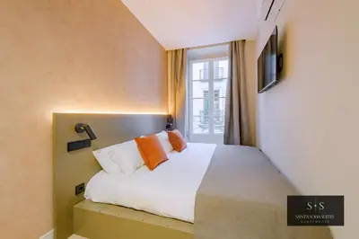 Cama o camas de una habitación en Santa Sofia Suites