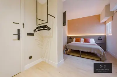 Cama o camas de una habitación en Santa Sofia Suites