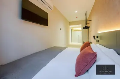 Cama o camas de una habitación en Santa Sofia Suites