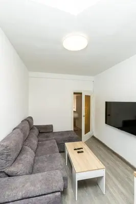 Una televisión o centro de entretenimiento en Apartament with balcony