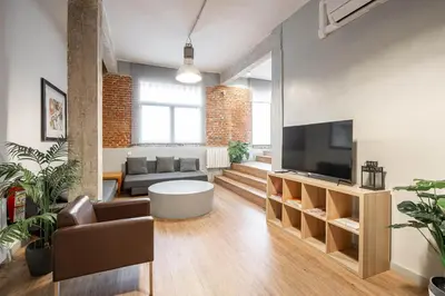 Una televisión o centro de entretenimiento en Apartamento Superior Prosperidad