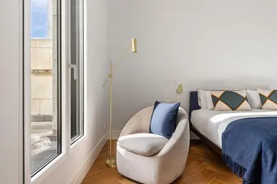 Cama o camas de una habitación en Waou Ático 2 Terrazas Gran Via - Corta Duración