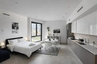 Una cocina o zona de cocina en APARTAMENTO COMPLETO CON PISCINA, GYM y COWORK
