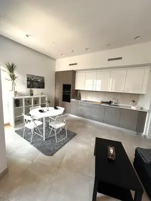 Una cocina o zona de cocina en APARTAMENTO COMPLETO CON PISCINA, GYM y COWORK