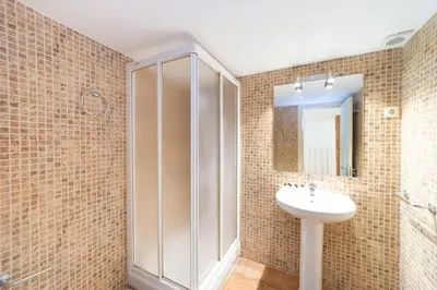 Un baño de Apartamentos Puerta Del Sol I
