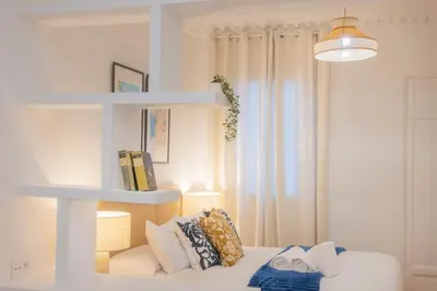 Cama o camas de una habitación en PSM87 Ático de lujo y luminoso con extraordinaria Terraza en el Centro de Madrid