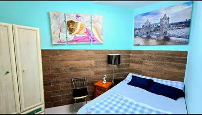 Cama o camas de una habitación en 4Caminos Madrid