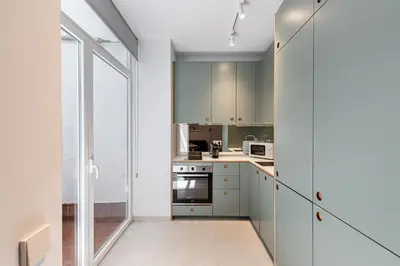 Una cocina o zona de cocina en Waou Urban Home Salamanca V