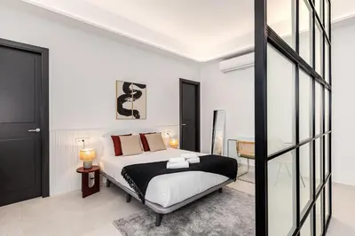 Cama o camas de una habitación en Waou Urban Home Salamanca V