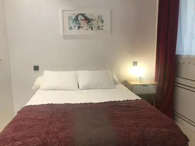 Cama o camas de una habitación en Huertas 20