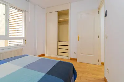 Cama o camas de una habitación en APARTAMENTO EN MADRID CENTRO comodo