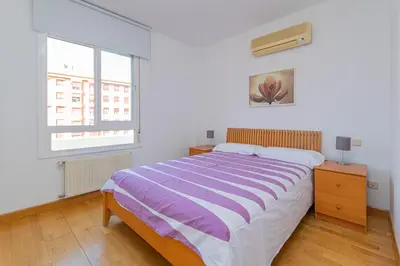 Cama o camas de una habitación en APARTAMENTO EN MADRID CENTRO comodo