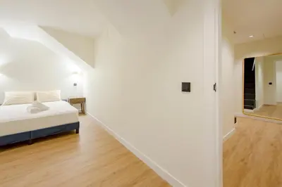 Cama o camas de una habitación en Alcalá Central Apartments