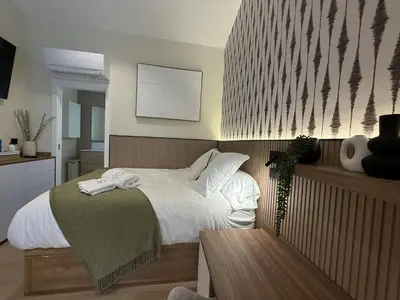 Cama o camas de una habitación en Nestanza Homes