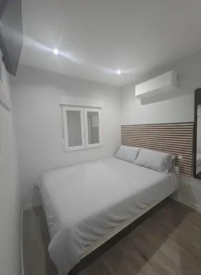 Cama o camas de una habitación en Habitación privada Madrid con baño compartido en Madrid