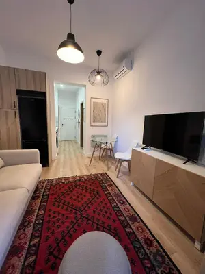 Una televisión o centro de entretenimiento en Dreamy 1BR with Great Balconny