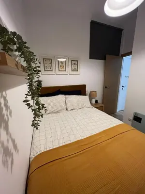 Cama o camas de una habitación en Dreamy 1BR with Great Balconny