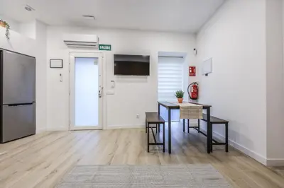 Una cocina o zona de cocina en Elegant Space for Your Madrid Stay