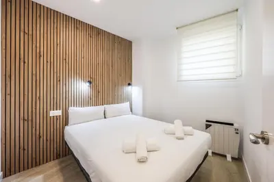 Cama o camas de una habitación en Modern Space for Your Madrid Stay